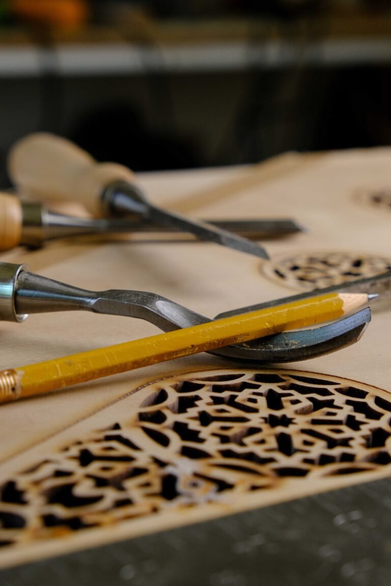 Qanun instrument under construction with tools